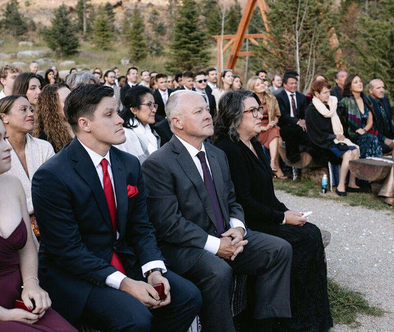 Guest wearing cohesive outfits to match the wedding dress codes of the event.