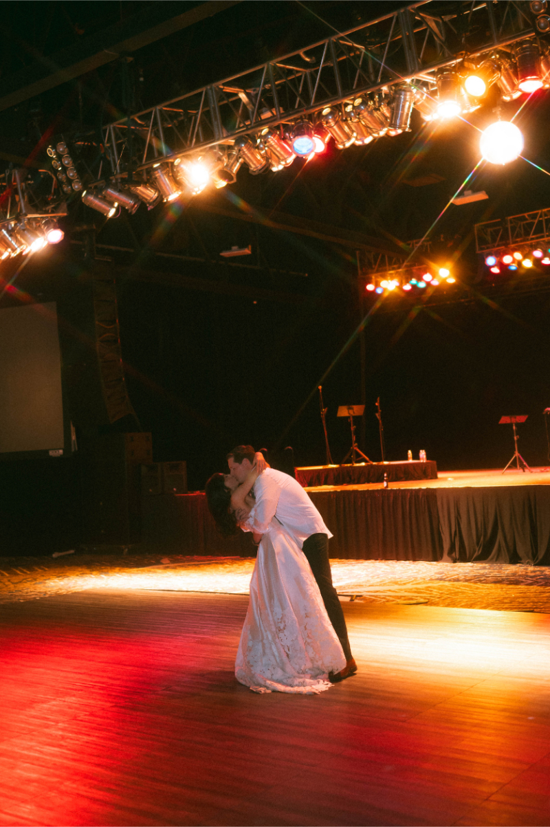 Bride and groom share private last dance during wedding reception at Inn of Mountain Gods.